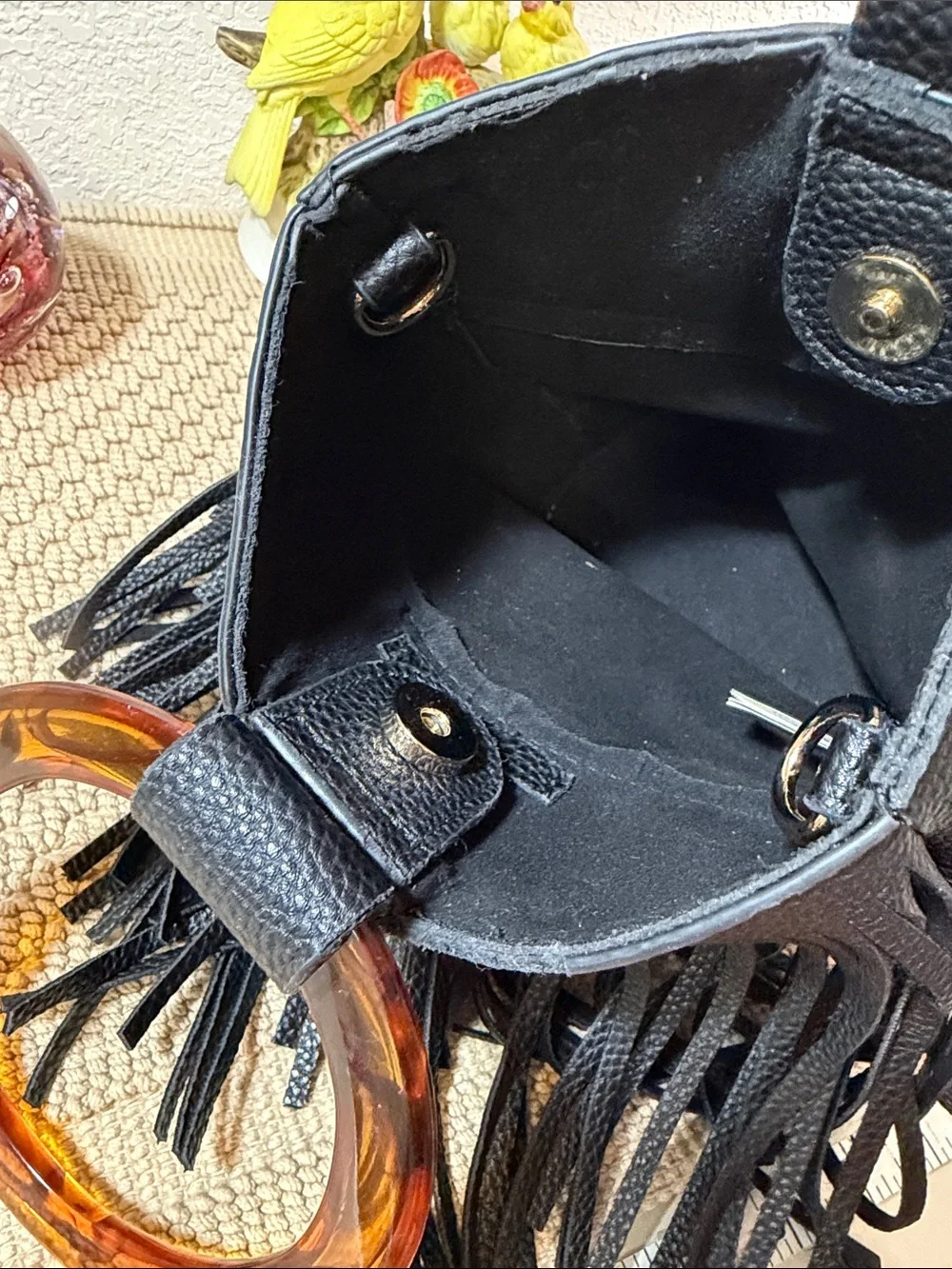 Black Fringed Wristlet with Amber Acrylic Ring Handle